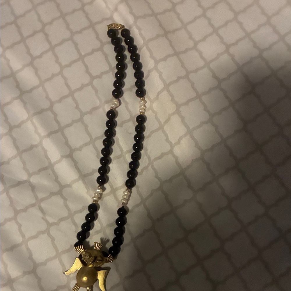 Gold Angel Pendant Necklace with Black Beads and Pearl Accents